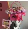 Композиция с цветами и конфеты любимой маме